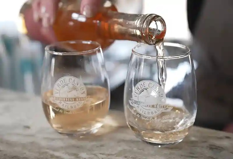 Grape Train Escape Verde Canyon Railroad Pouring Wine Grape Train Escape Verde Canyon Railroad Pouring Wine