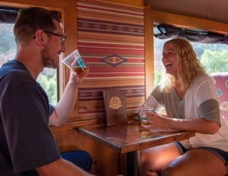 Passenger Cars Verde Canyon Railroad Couple Enjoying Refreshment Passenger Cars Verde Canyon Railroad Couple Enjoying Refreshment